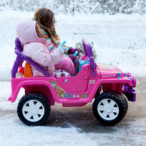 Marlo and Leta in a jeep